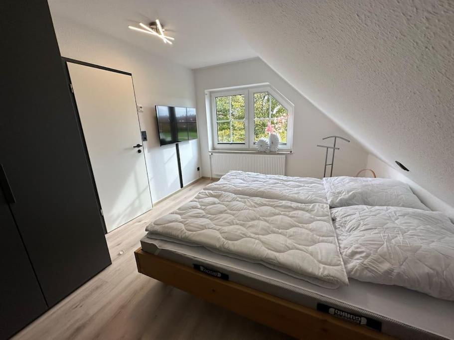 Ferienwohnung Haus Zuckersnuut Dornum Exterior foto